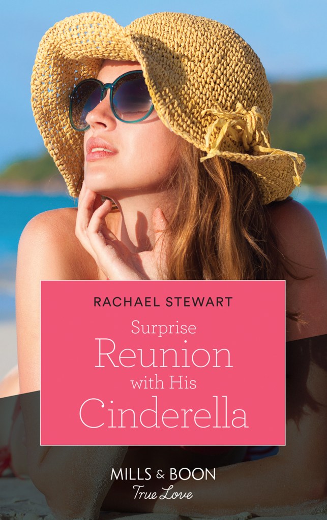 Cover of Surprise Reunion with His Cinderella by Rachael Stewart. Red-headed woman in a sun hat and wearing sunglasses laying on the beach and tipping her head towards the sun 